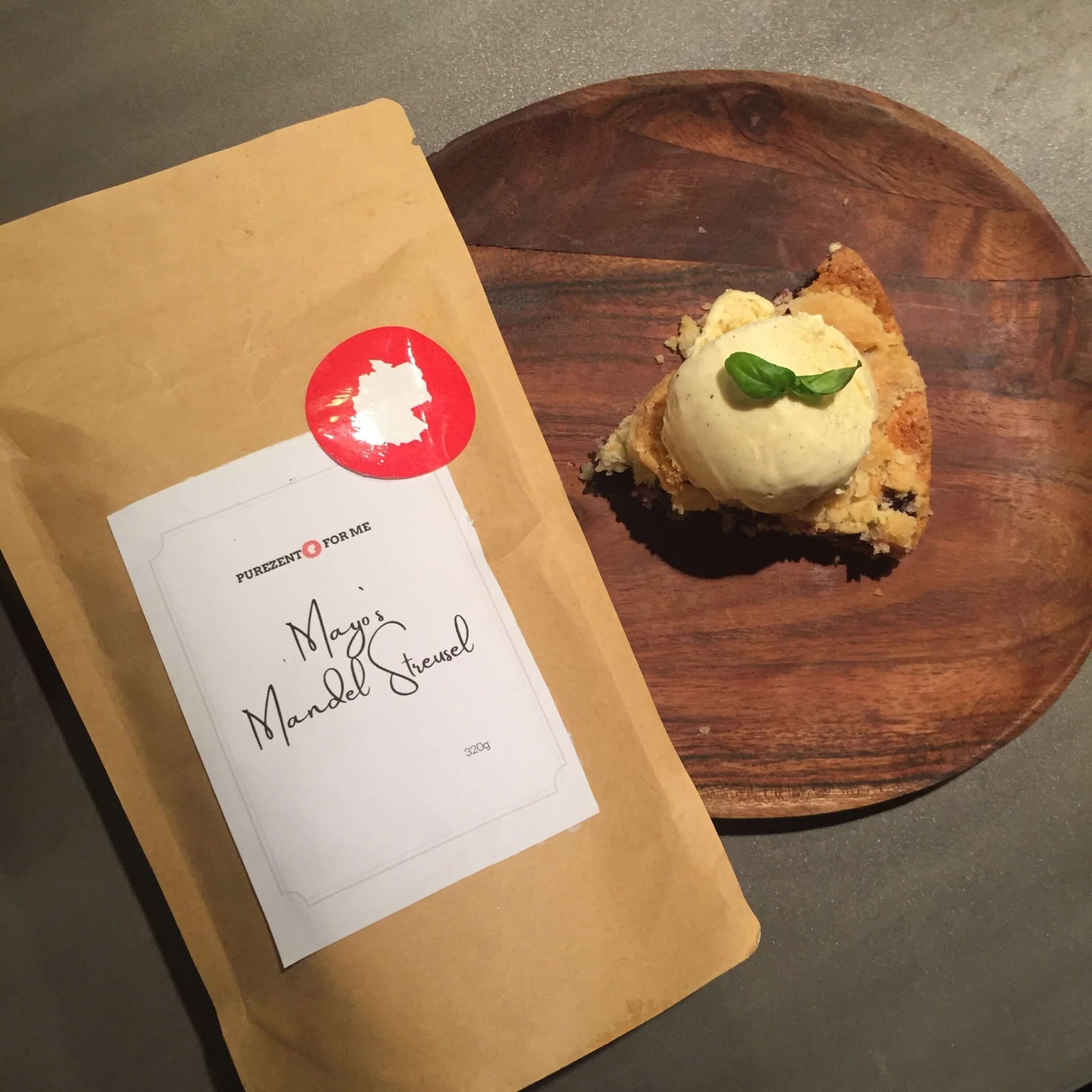 mayos almond crumble Product packaging with bread baking mixture cake on wooden plate with ice cream purezento for me website www.purezentoforme.com