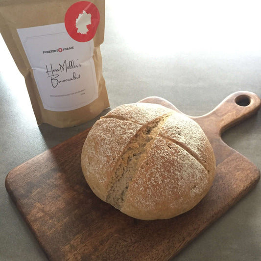 mr mullers farmers bread Product packaging with bread baking mixture baked bread on wooden plate purezento for me website www.purezentoforme.com
