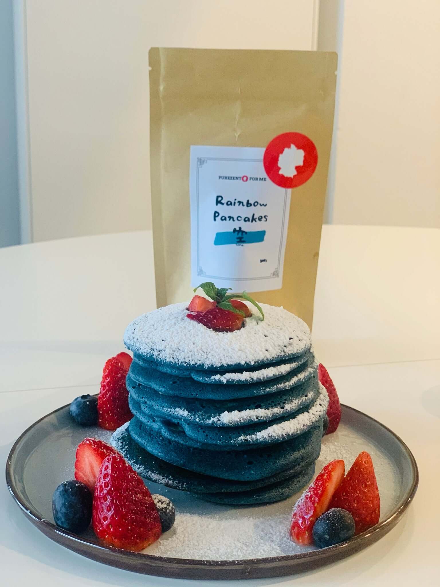 rainbow pancakes zora blue Product packaging with natural colored pancake baking mixture blue pancakes on plate 1 purezento for me website www.purezentoforme.com